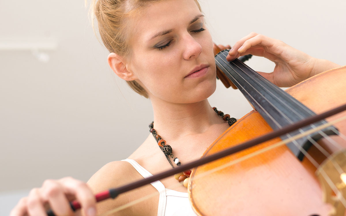 Musician playing cello.