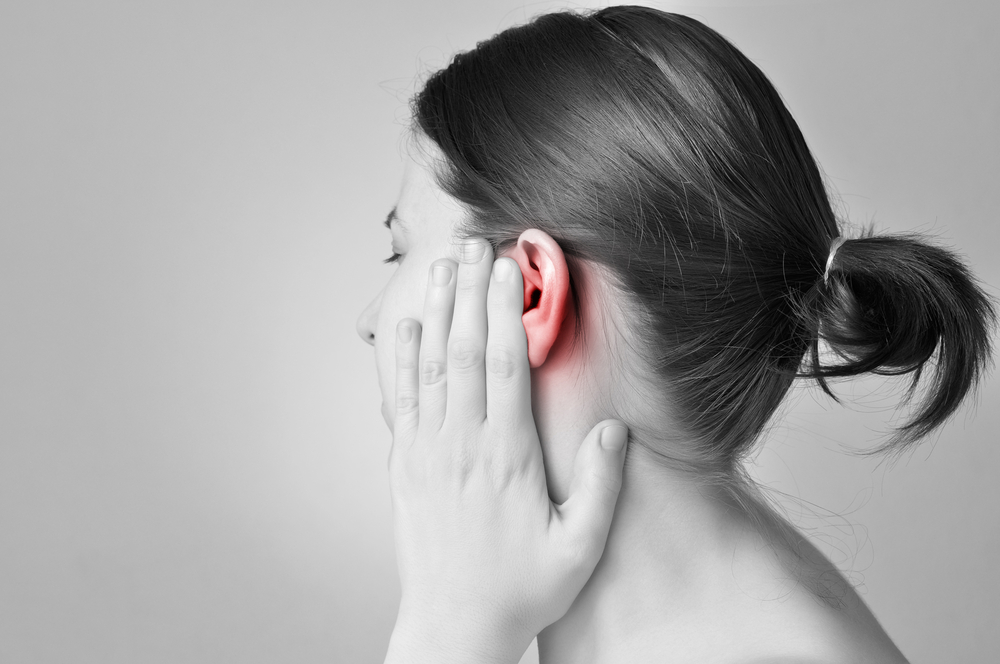 Woman with ear infection.