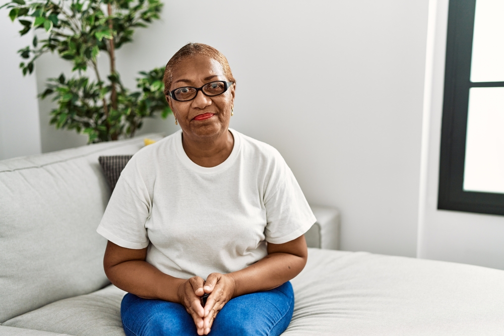 woman sitting on the sofa at home.